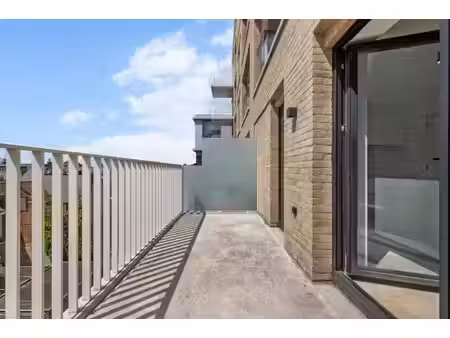 modern nieuwbouwappartement te koop in roeselare met gunstige oriëntatie