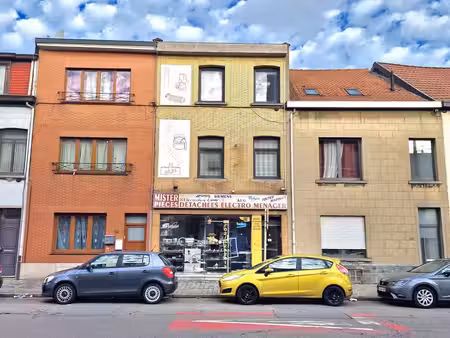 maison de commerce et d'habitation avec jardin