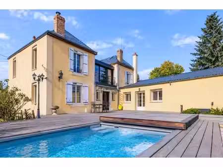 proche circuit des 24h: ensemble immobilier composé d’une mai...