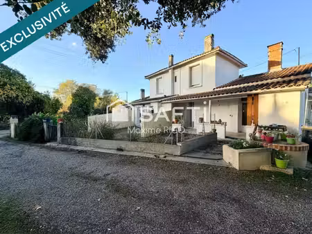 immeuble de rapport - 5 appartements et 7 garages