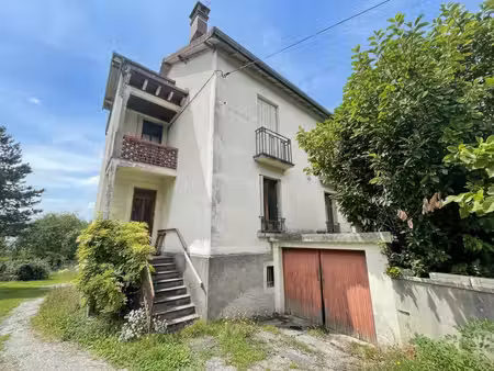 maison en pierre à lons-le-saunier : deux appartements indépendants  jardin de 770 m²  sou